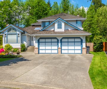 Homeowner reviewing a written garage door estimate
