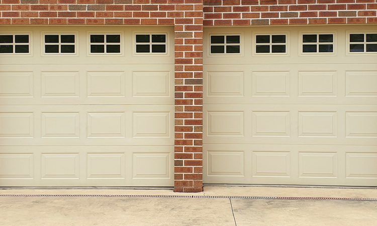Commercial rolled steel door on a Tulsa warehouse bay