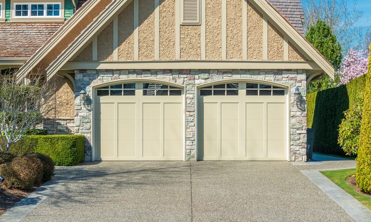 New insulated steel garage door installed on an Oklahoma home
